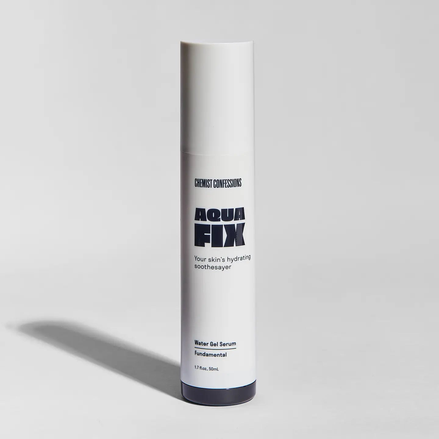 Skincare serum bottle labeled &